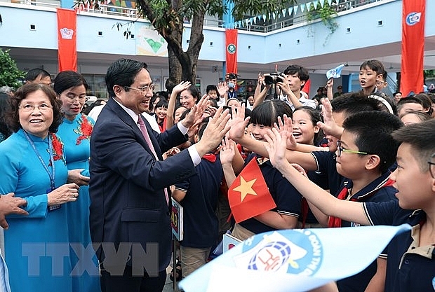 Thủ tướng Phạm Minh Chính với học sinh Trường Tiểu học Đoàn Thị Điểm